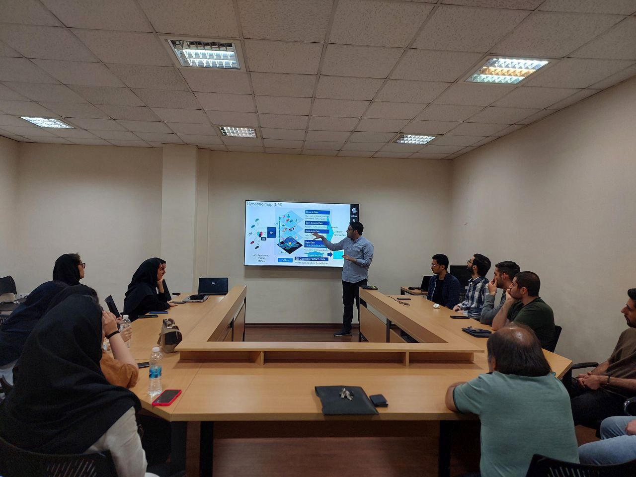 Mr. Kashani presenting the AISL simulator project.